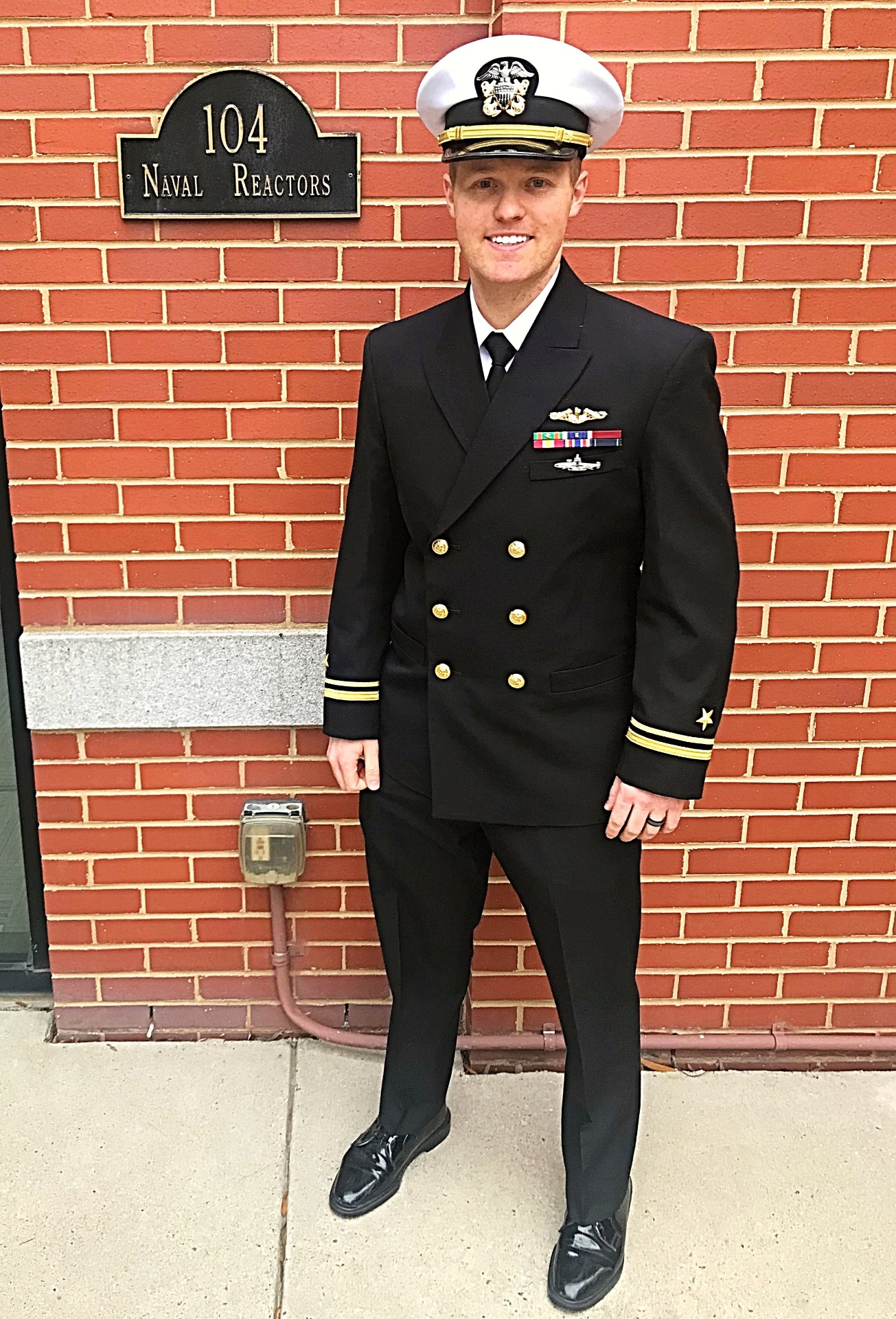 Remington Carlson in U.S. Navy dress uniform outside Naval Reactors, building 104.